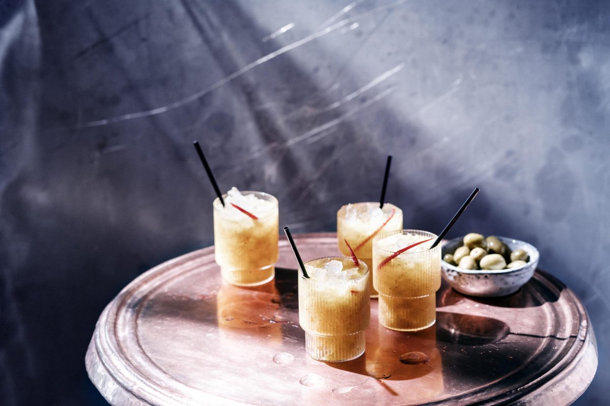 Cocktails and olives on a table at the Renaissance Bar, Badrutt’s Palace Hotel, St. Moritz