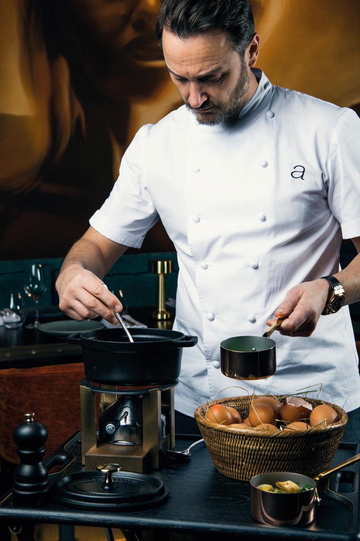 Jason Atherton prepares tableside at King’s Social House, St. Moritz