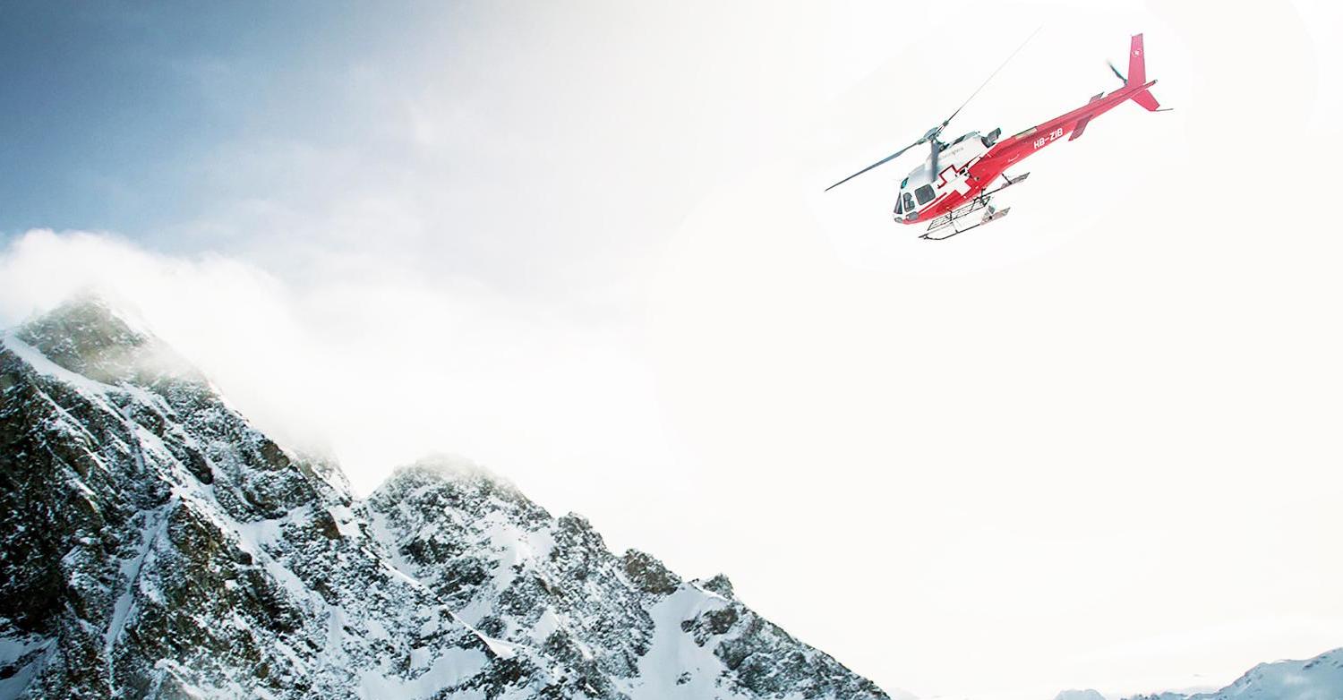 Helicopter over mountains