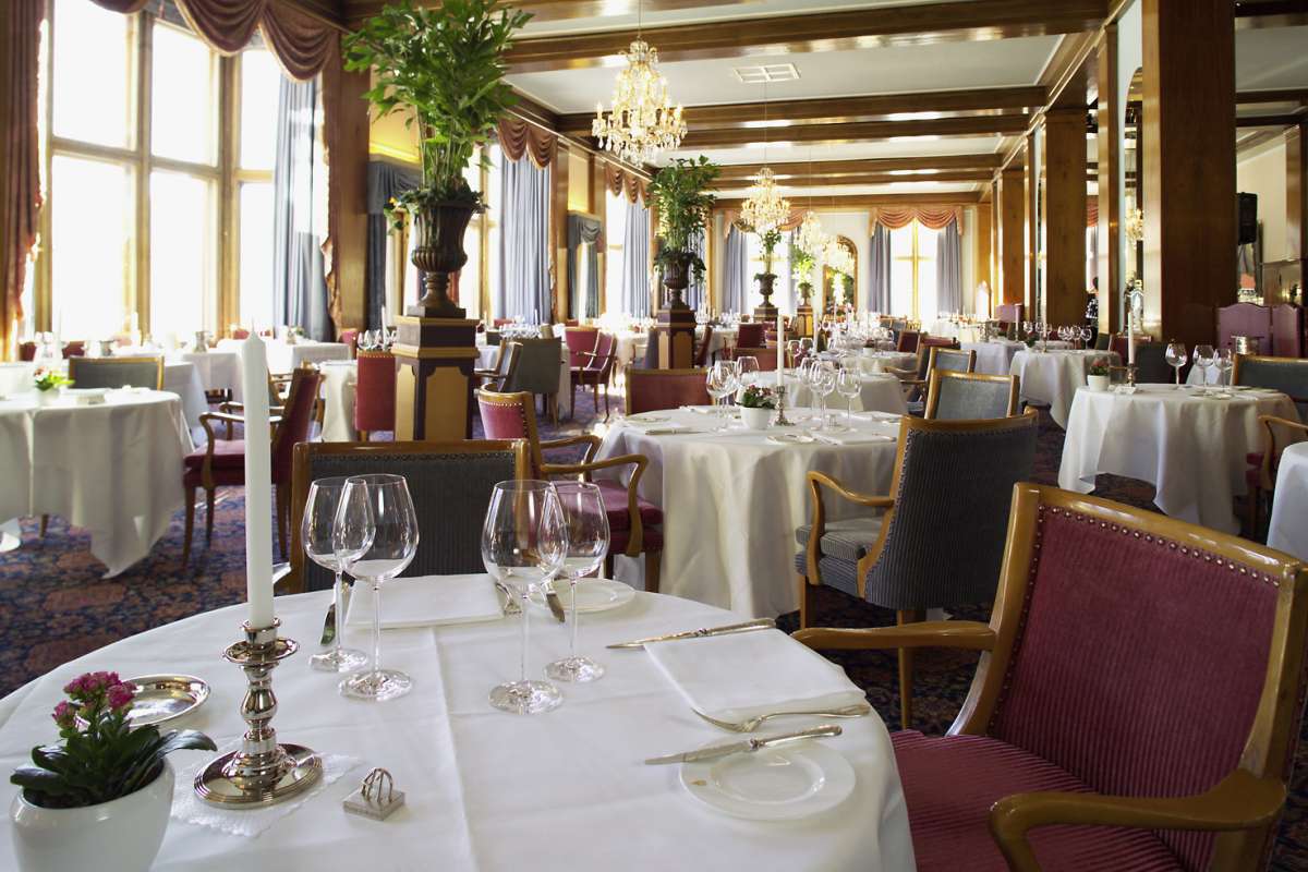 The dining room of Le Restaurant at Badrutt's Palace Hotel