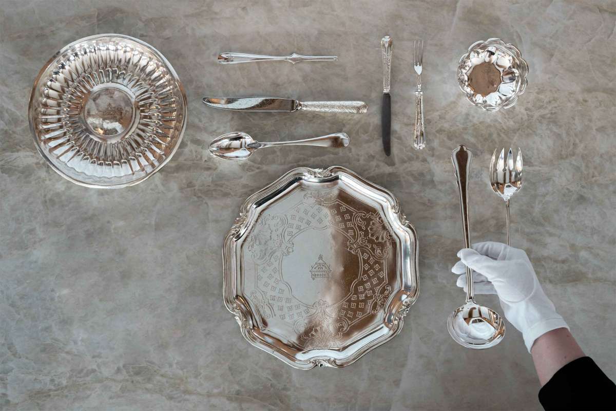 Table set with silverwear, Badrutt's Palace Hotel, St. Moritz