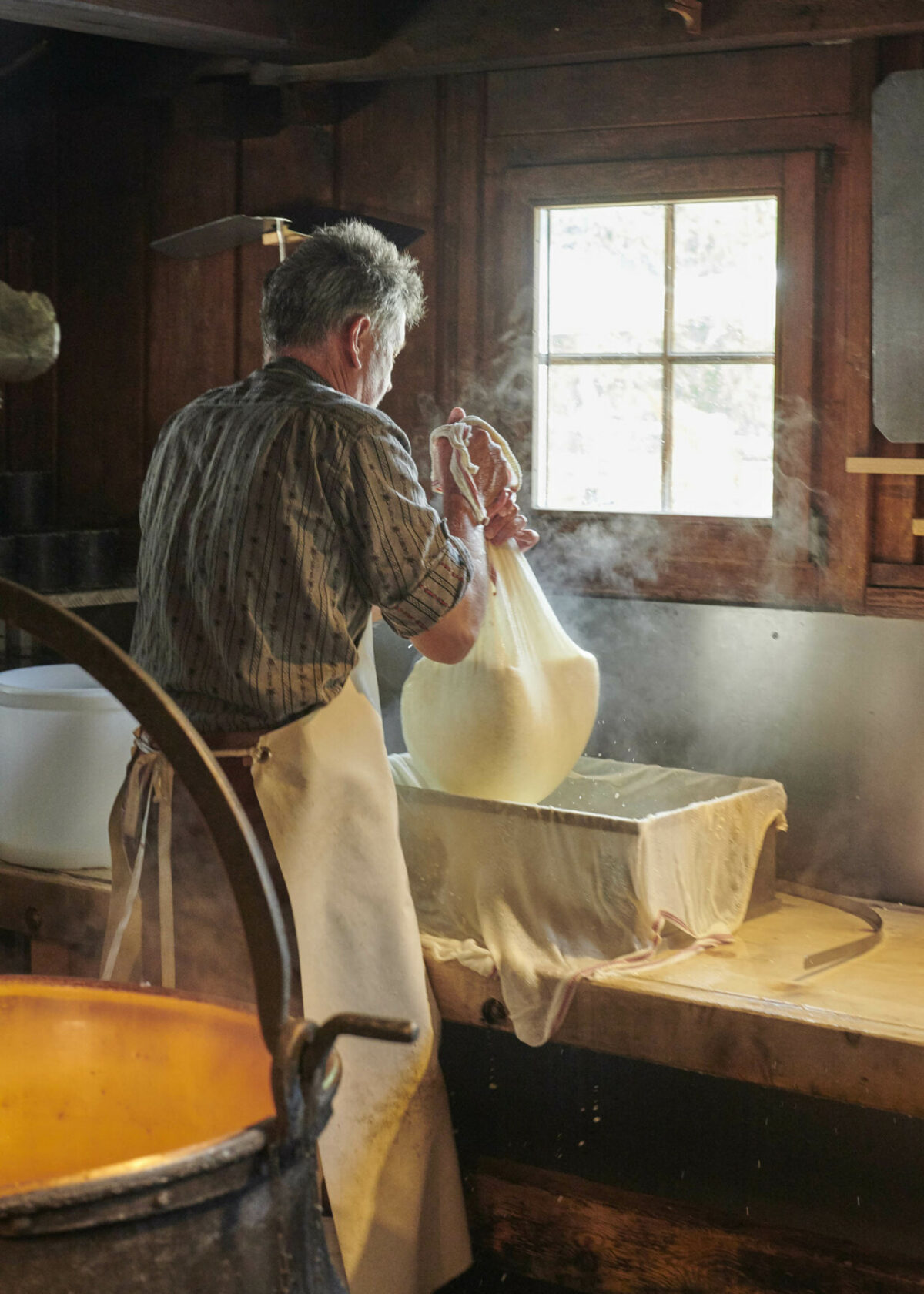 Cheese-making demonstration at Sennerei Pontresina, Engadin, Switzerland