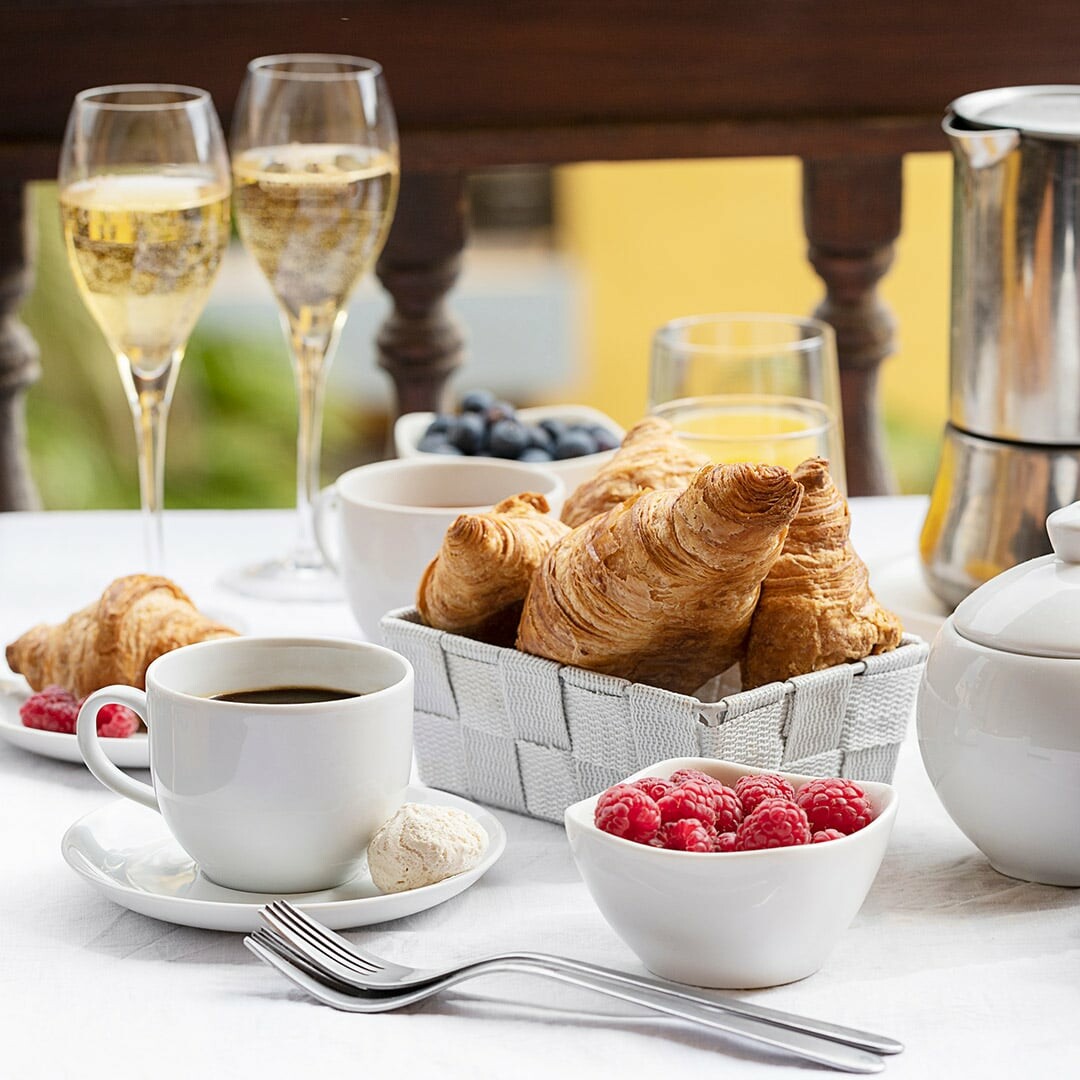 Champagne breakfast, with croissants and fresh fruit