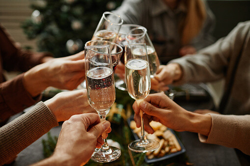 A group of people making a Champagne toast