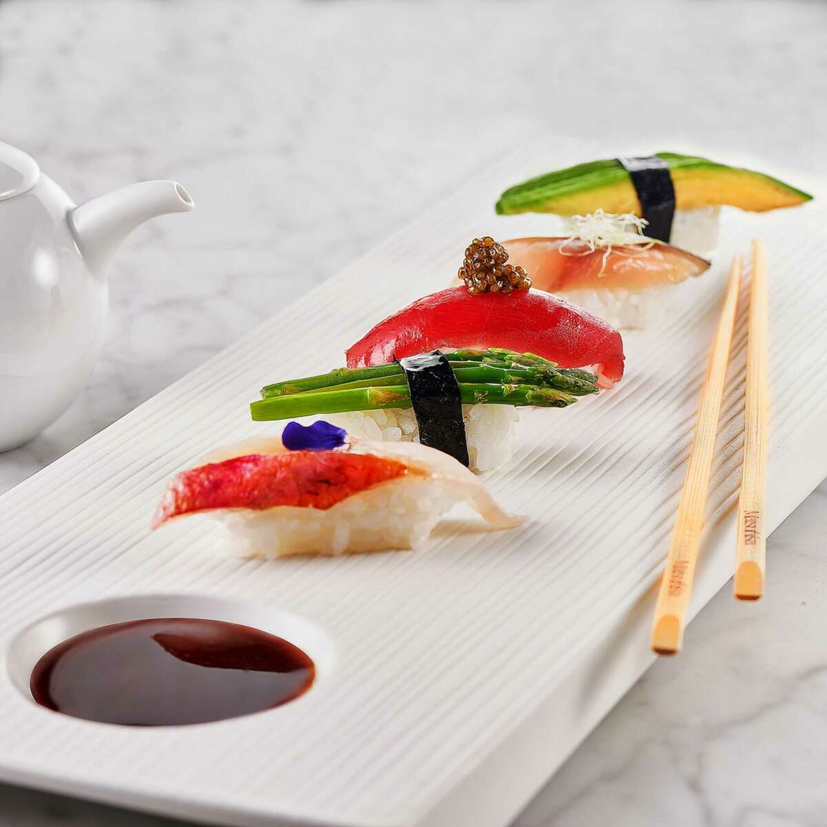 Sushi beautifully presented on a plate