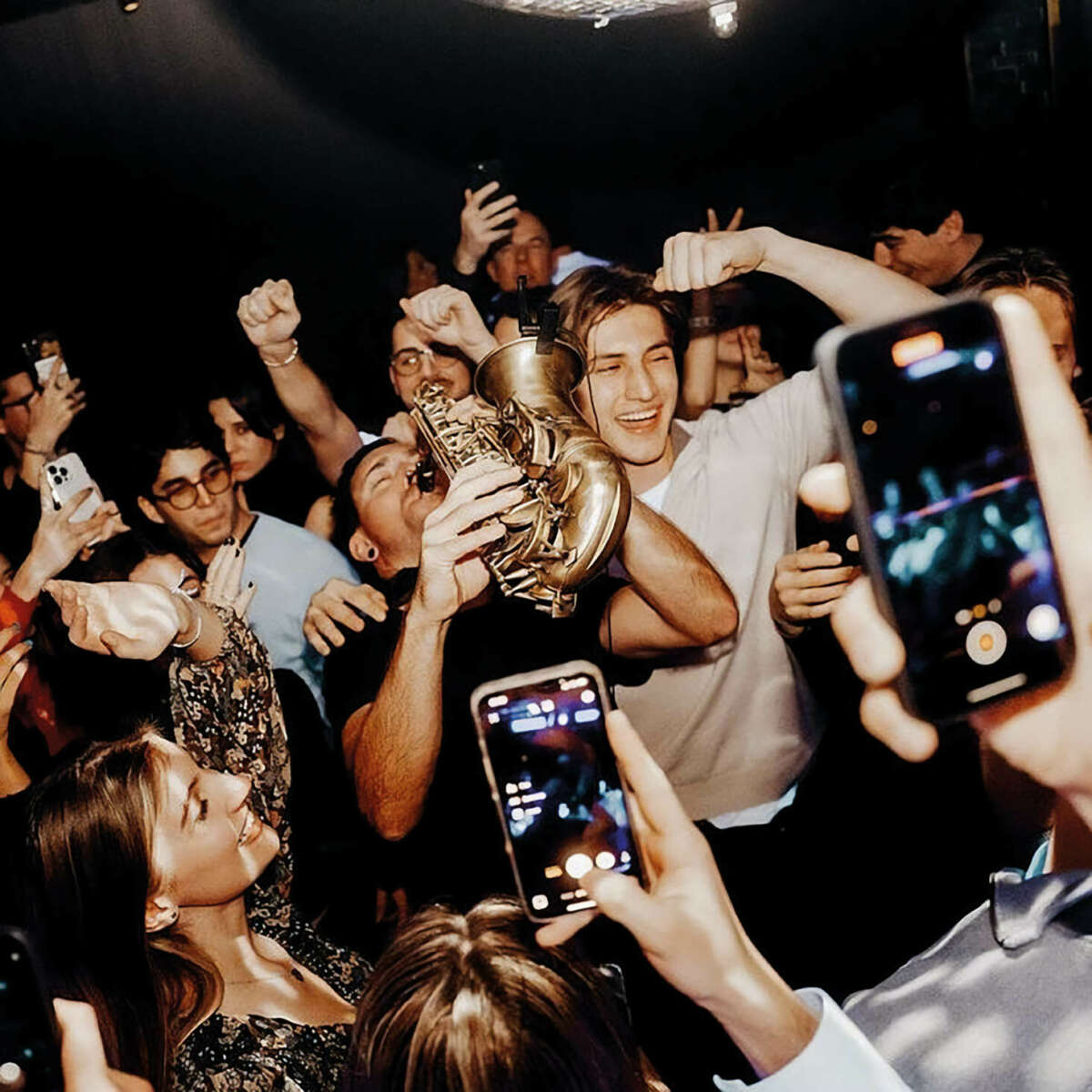 A group of young people at a bar